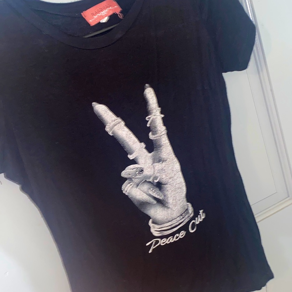 Black shirt with a gray hand doing a peace sign